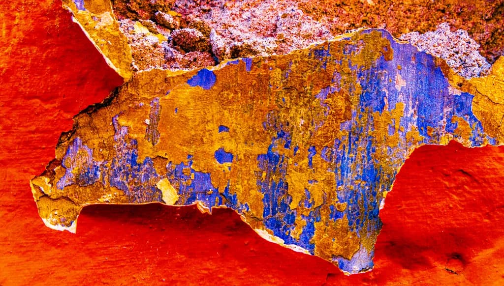 Vibrant Decay: A Kaleidoscope of Color in Weathered Layers