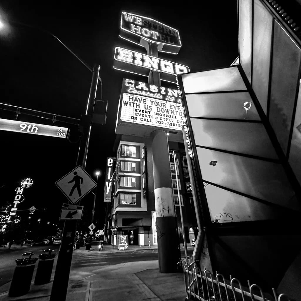 Neon Dreams: A Nighttime Stroll Through Urban Signage and Shadows