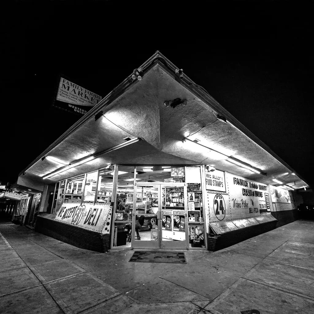 Midnight Market: A Poetic Glimpse into Urban Life in Black and White