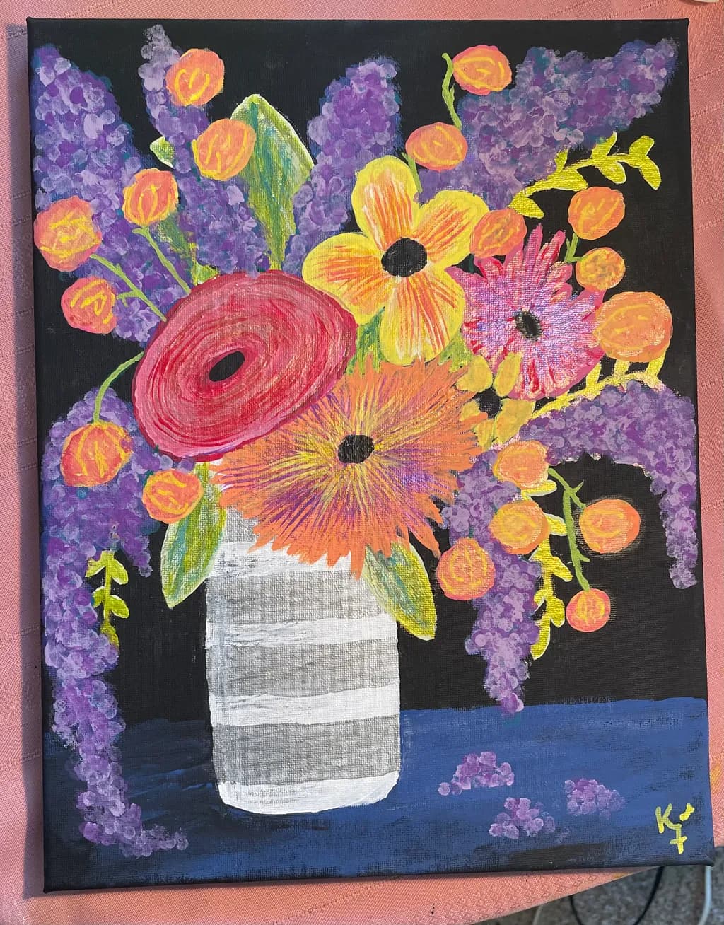 Vibrant Floral Symphony: A Colorful Bouquet in Striped Vase