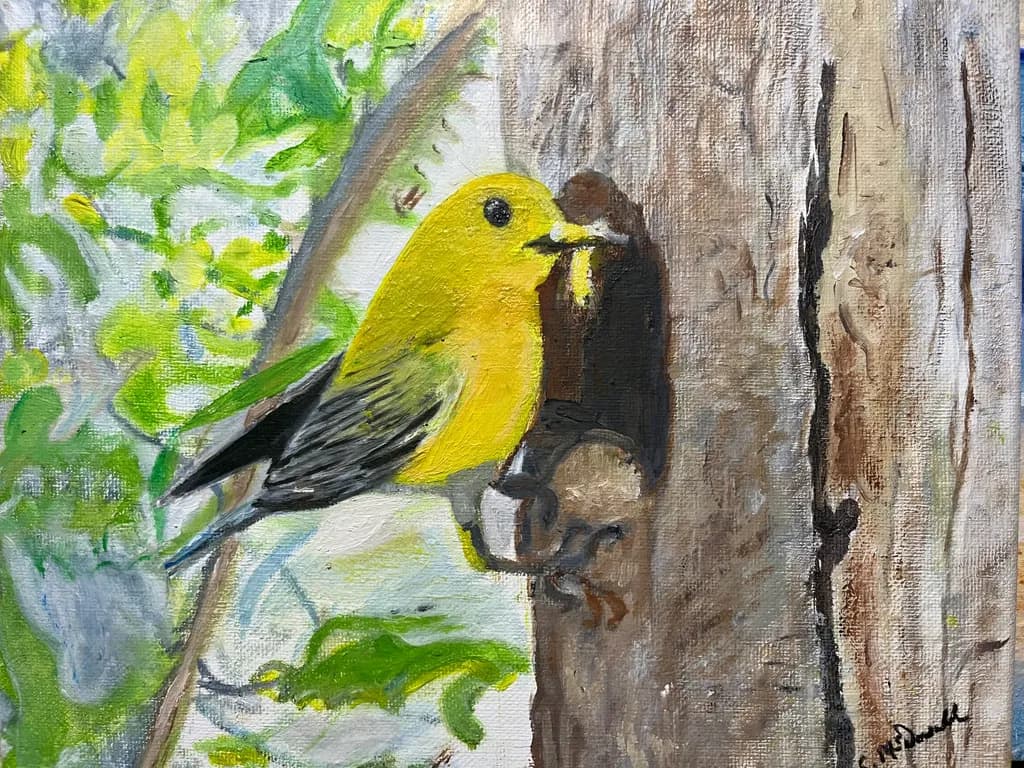 Golden Melody: A Vibrant Yellow Bird Amidst Nature's Embrace