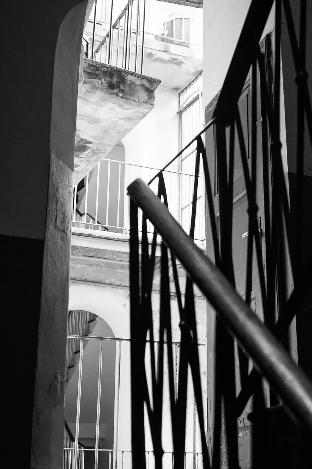 Monochrome Echoes: Shadows and Depth in Architectural Staircases