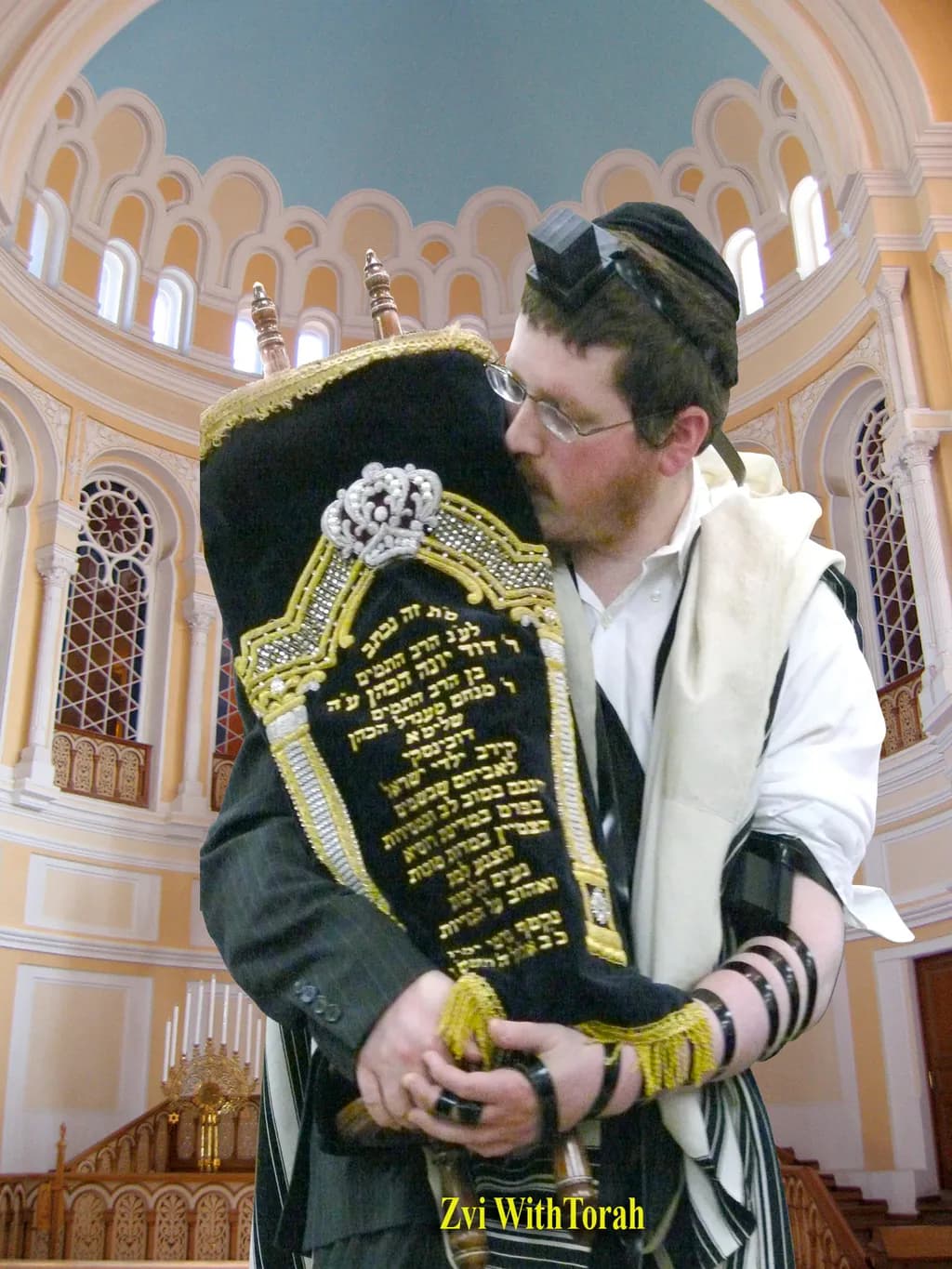 Embrace of Tradition: A Sacred Moment with the Torah