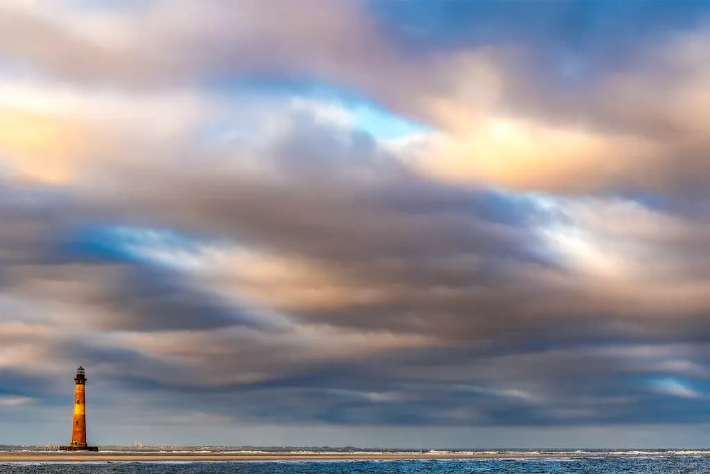 Guiding Light: A Lighthouse Beneath the Changing Skies