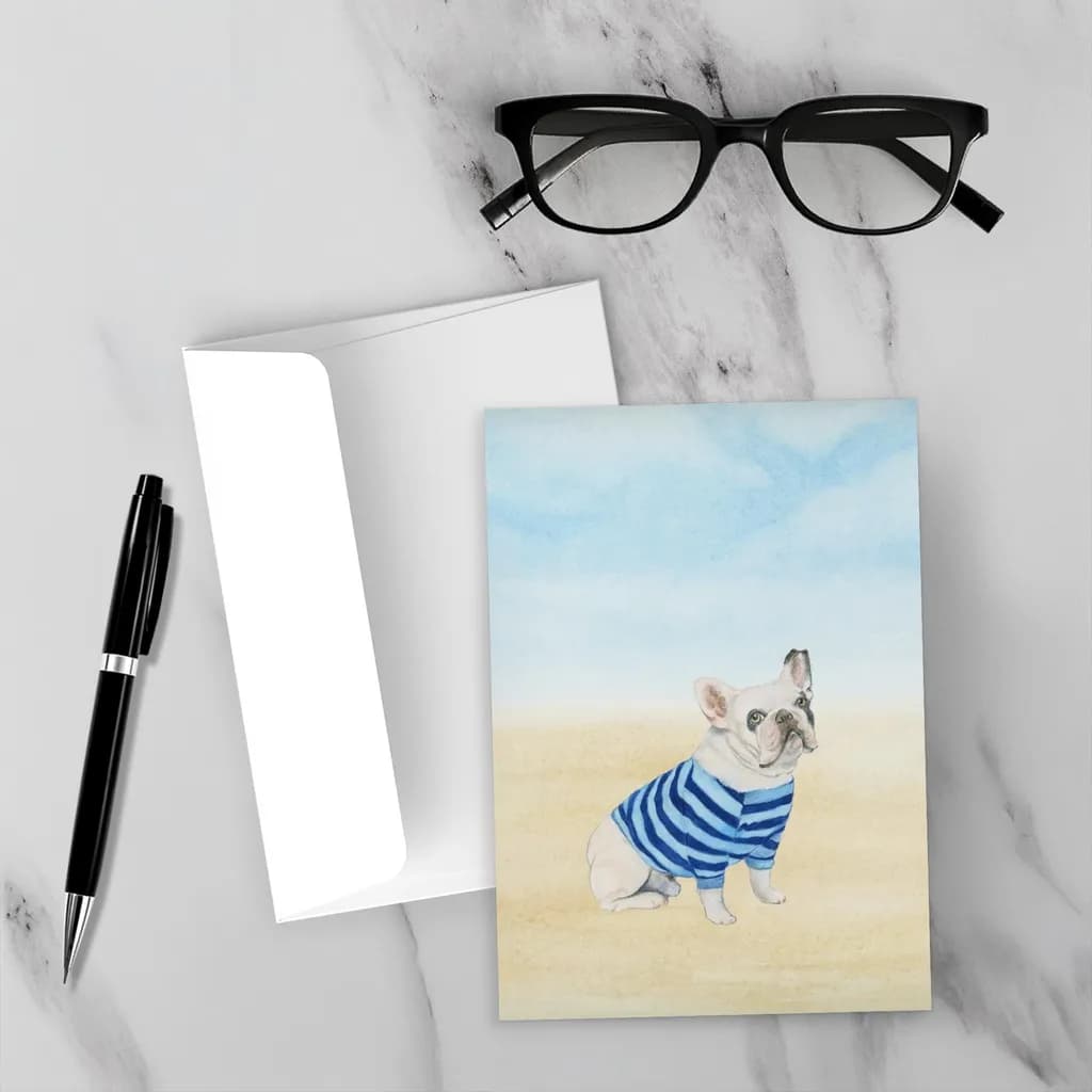 Chic Canine in Stripes: A Whimsical Portrait of a French Bulldog on the Beach