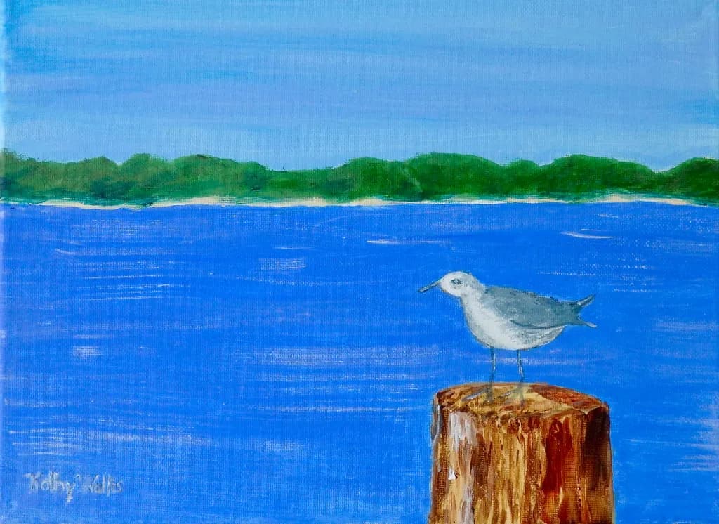 Serenity by the Shore: A Seagull's Perch Over Tranquil Waters