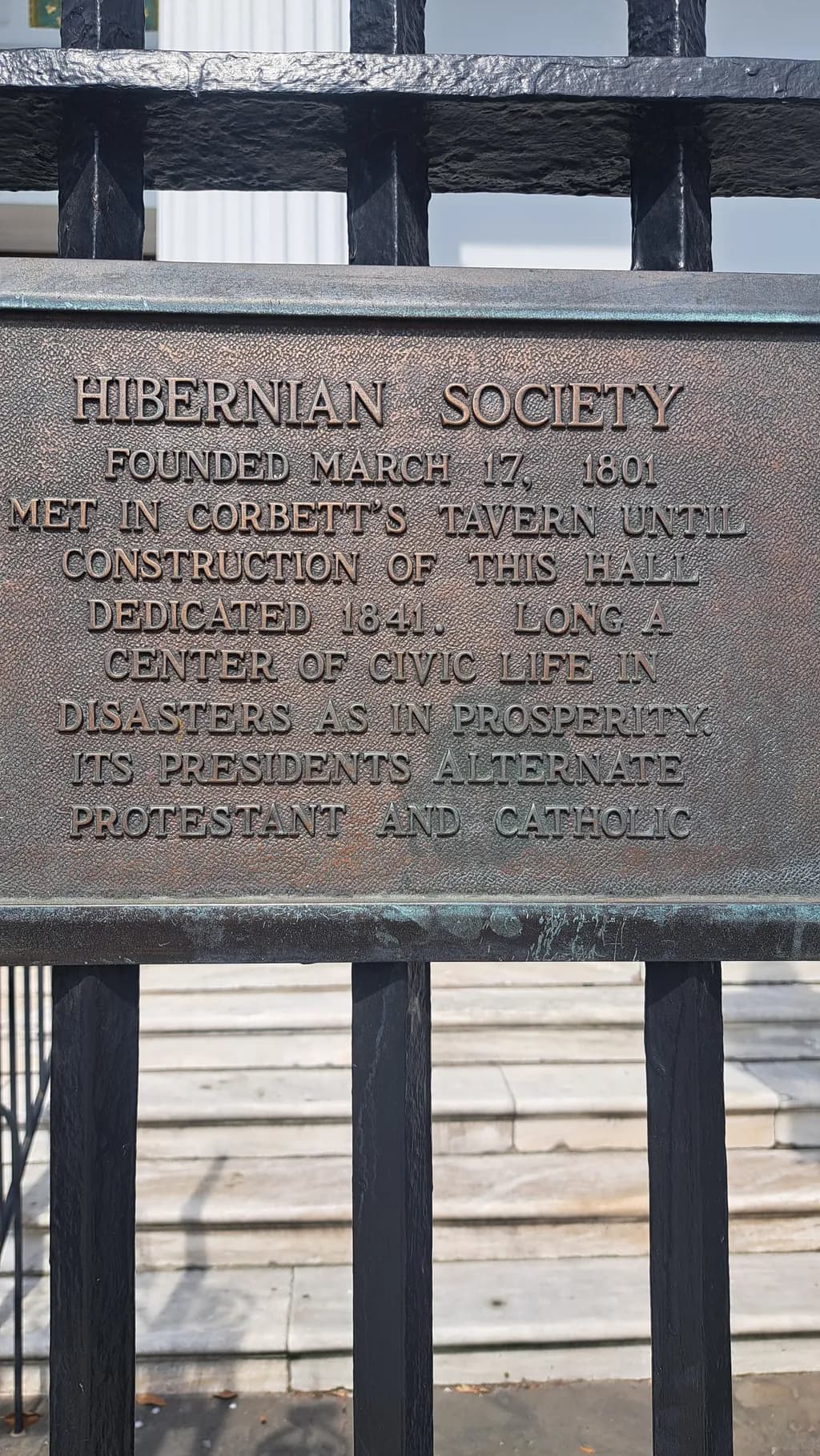 Echoes of Civic Life: The Hibernian Society Plaque - A Bronze Tribute to History and Community