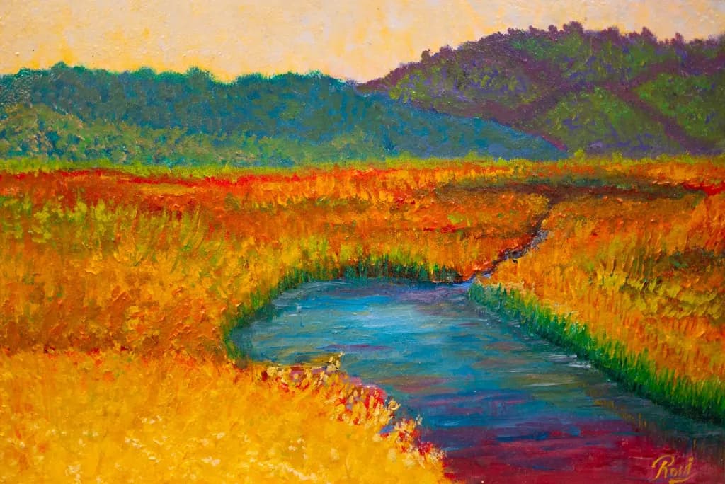 Golden Serenity: A Tranquil Stream Through Vibrant Fields at Dusk