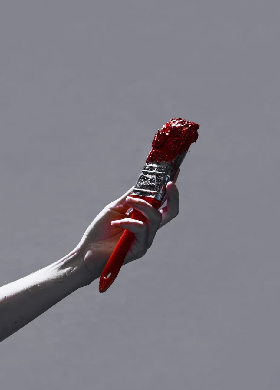Vibrant Expression: The Art of a Red Brush in Motion