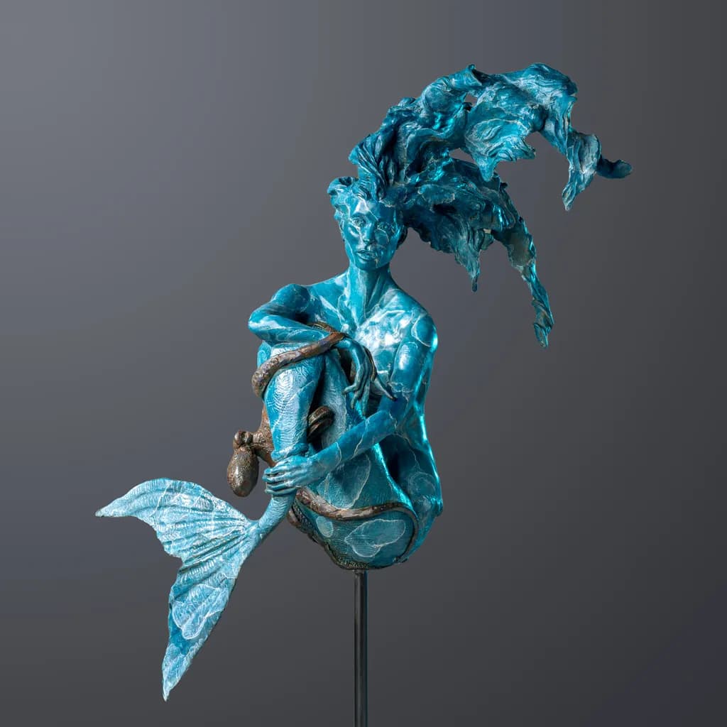 Ethereal Serenity: A Captivating Mermaid Sculpture in Turquoise Elegance