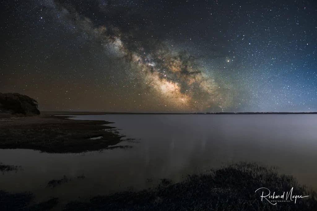 Celestial Reflections: The Milky Way Over Tranquil Waters