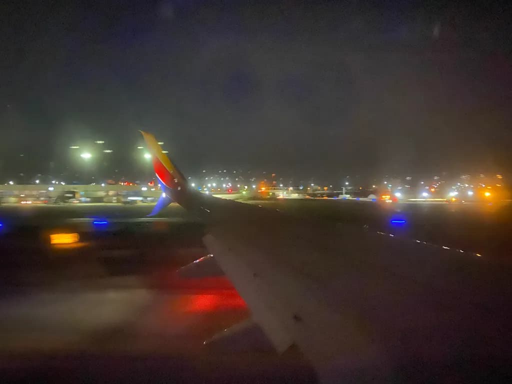 Nighttime Landing: A Journey Through City Lights and Skyways