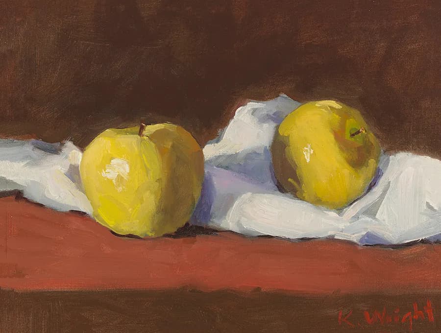 Golden Harmony: A Still Life of Yellow Apples on White Linen