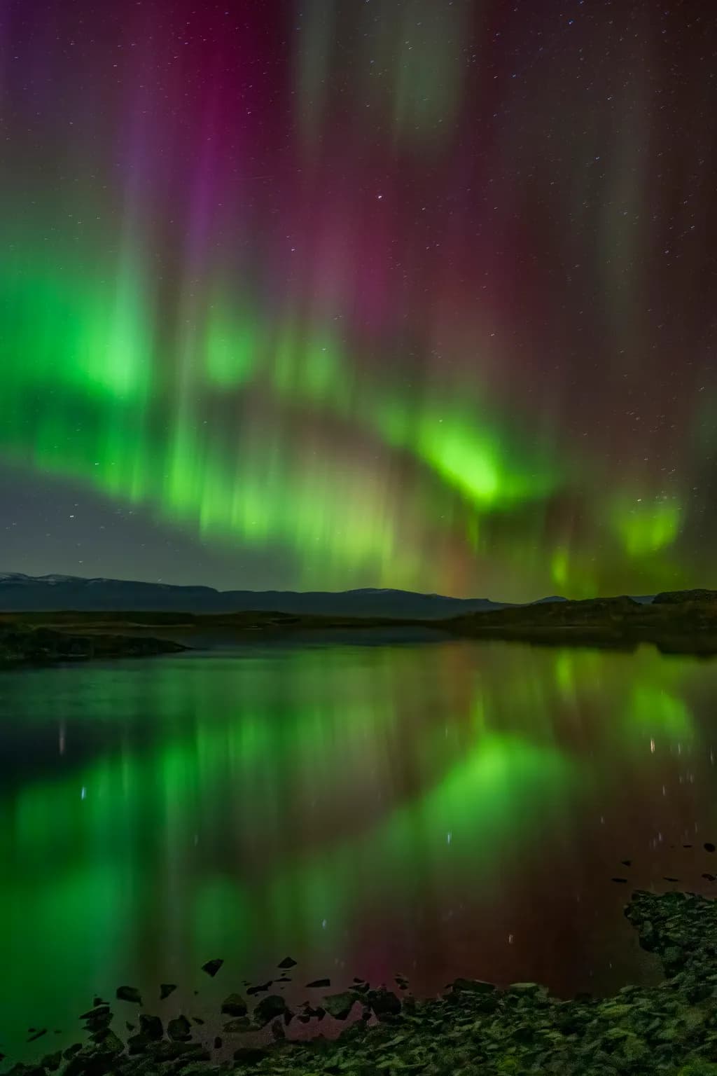 Whispers of the Aurora: A Dance of Light and Reflection