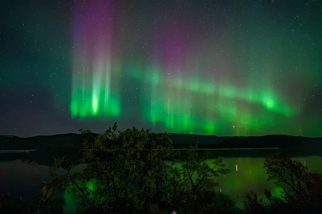 Whispers of the Aurora: A Dance of Light and Shadow in the Night Sky