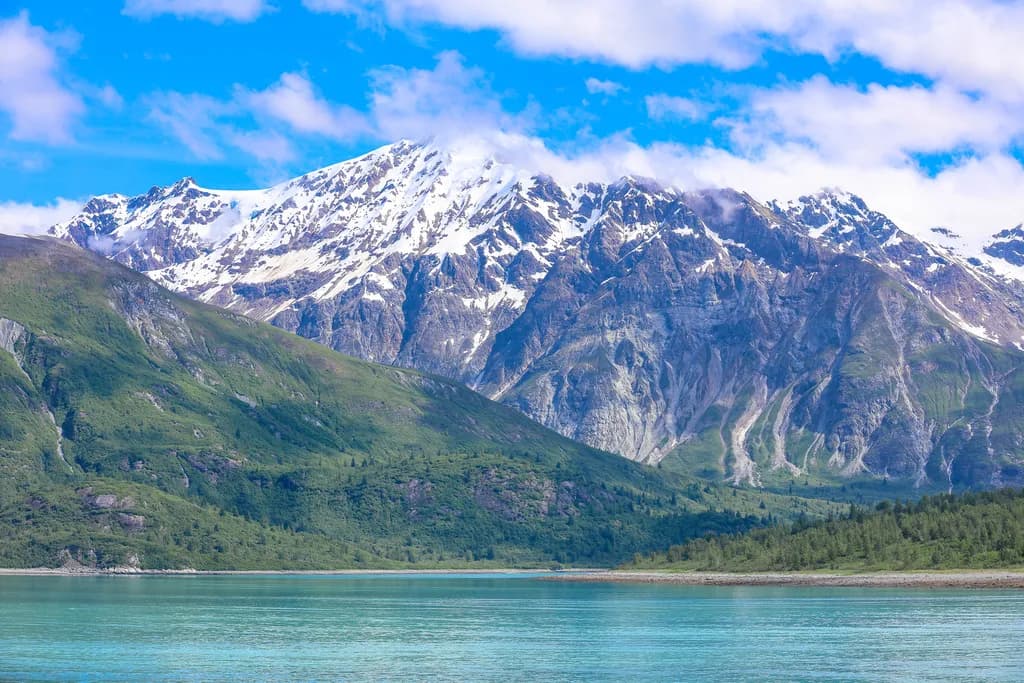 Majestic Peaks: A Serene Reflection of Nature's Grandeur in Vibrant Blues and Greens