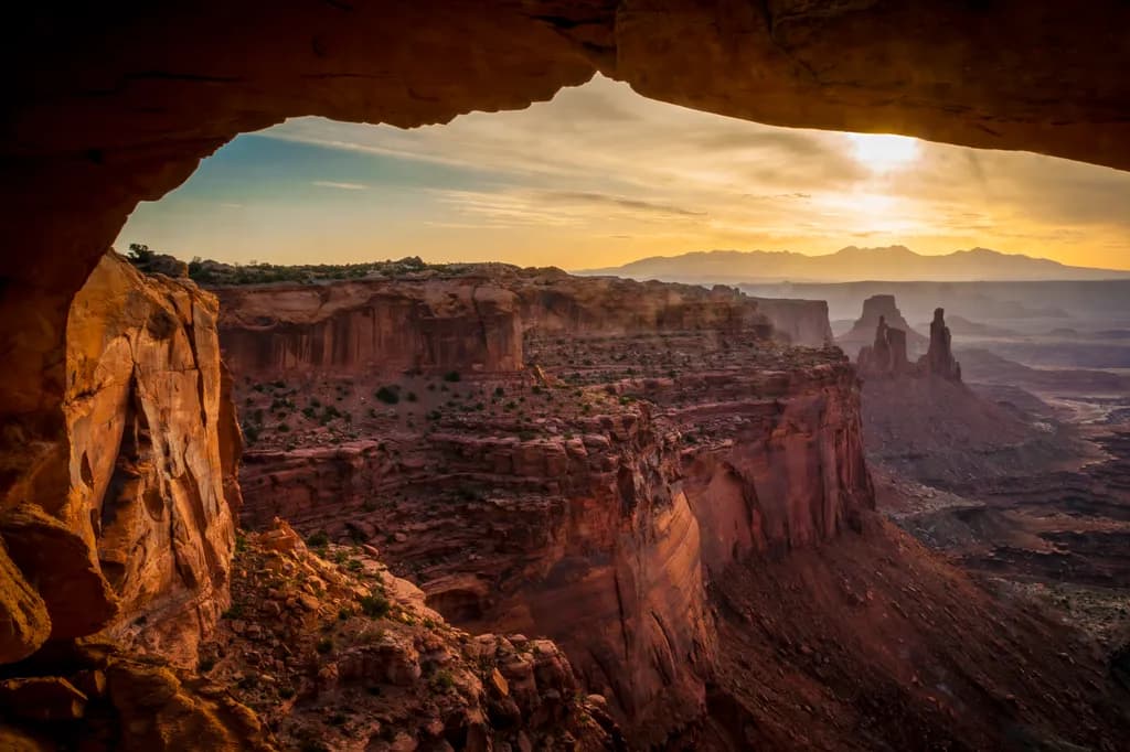Desert Dawn: A Majestic View Through the Archway of Time