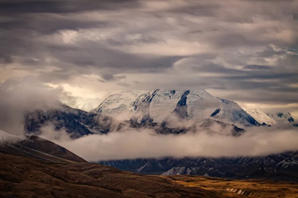Clouds Kiss the Summit
