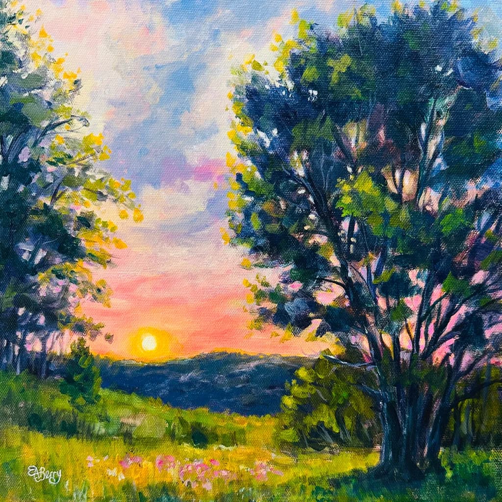 Sunset Over Hills and Trees