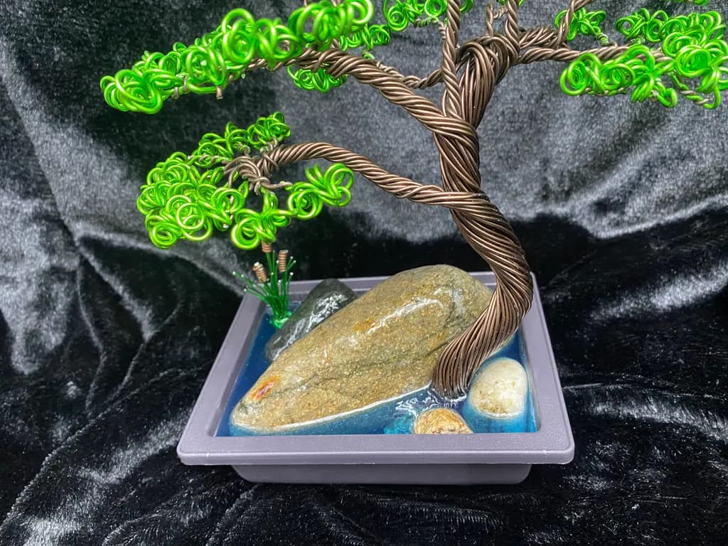 Whispers of Nature: A Decorative Green Tree Sculpture with Stone Accents