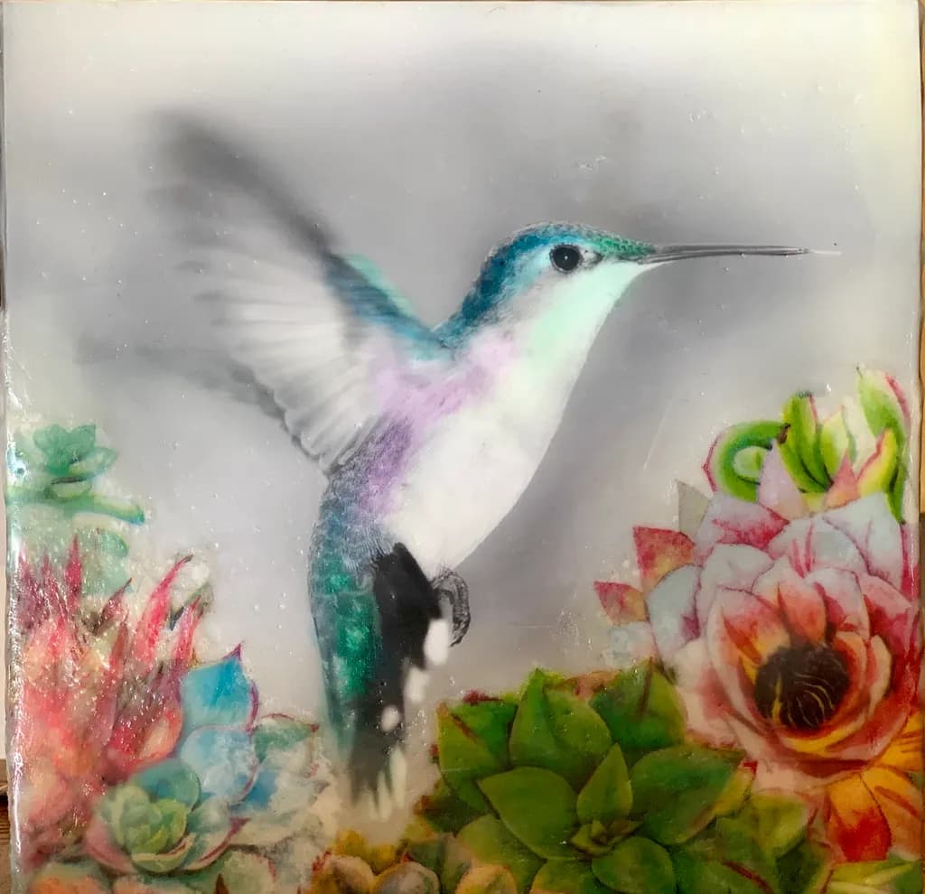 Whispers of Color: A Hummingbird's Dance Among Blossoms