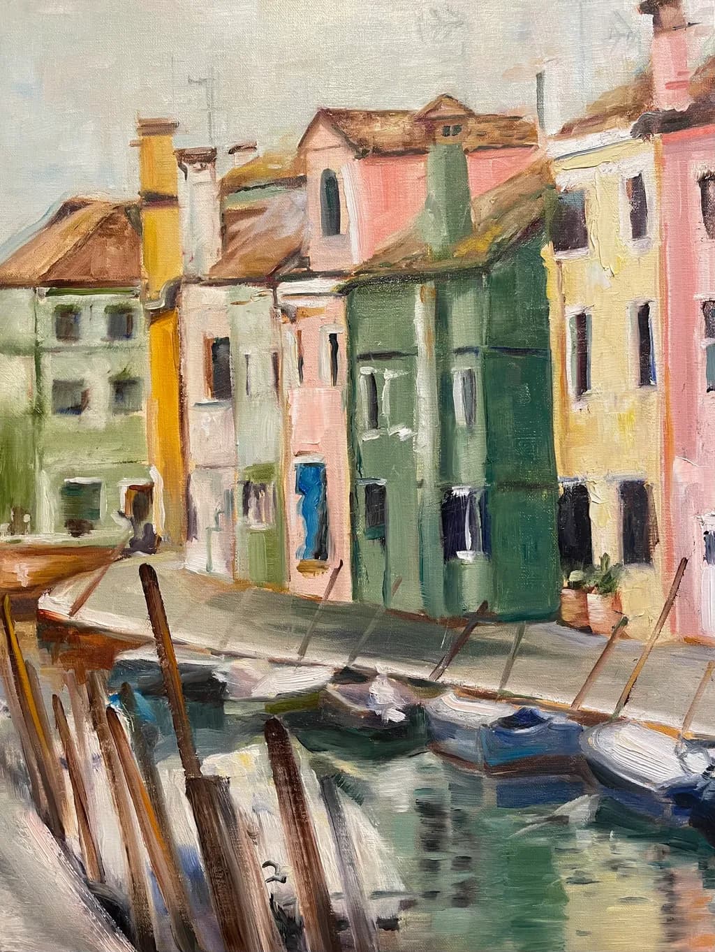 Whispers of Color: A Serene Canal Scene with Charming Waterfront Homes
