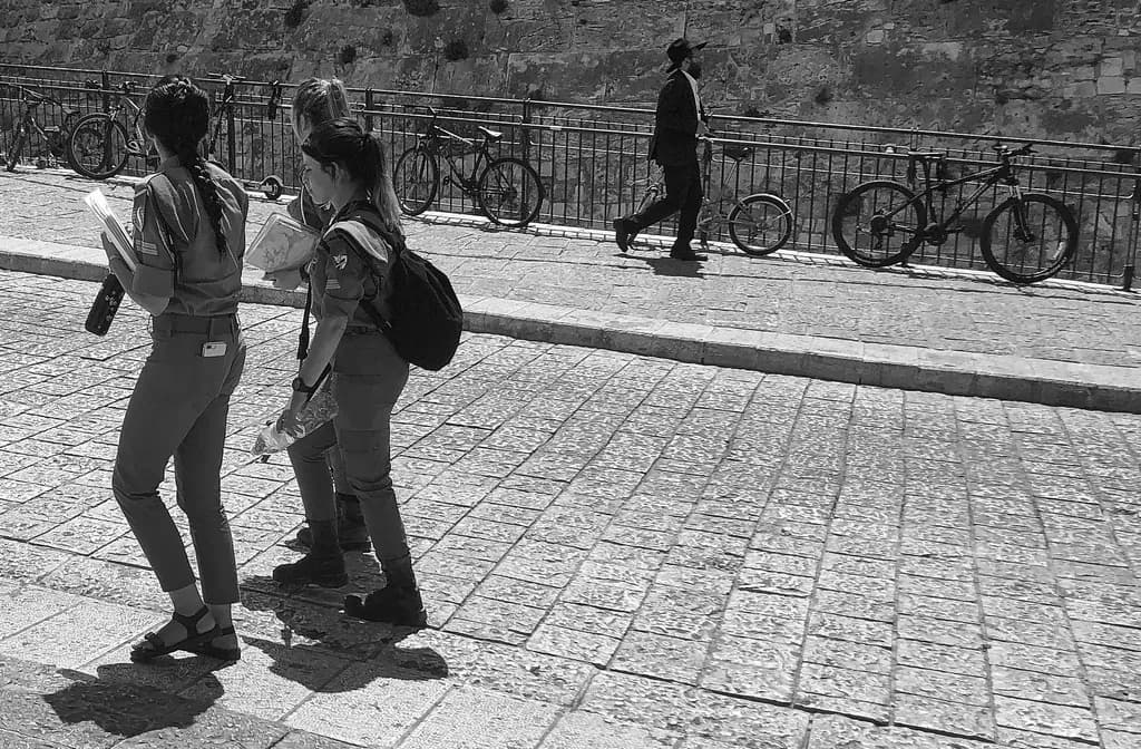 Urban Whispers: A Dance of Shadows and Motion in Black and White