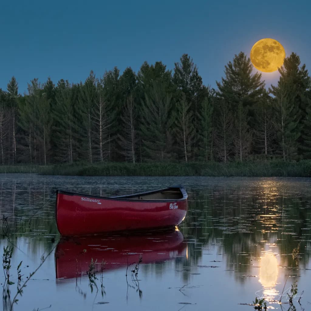 Canoe on Forest Lake at Moonrise
