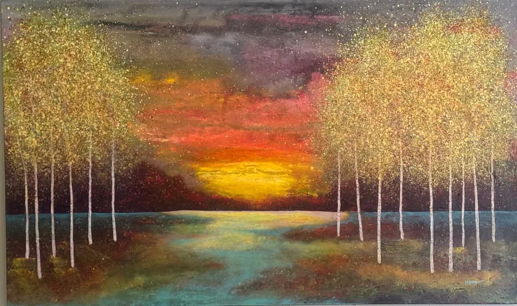 Golden Serenity: A Colorful Sunset Over Tranquil Waters and Whispering Trees