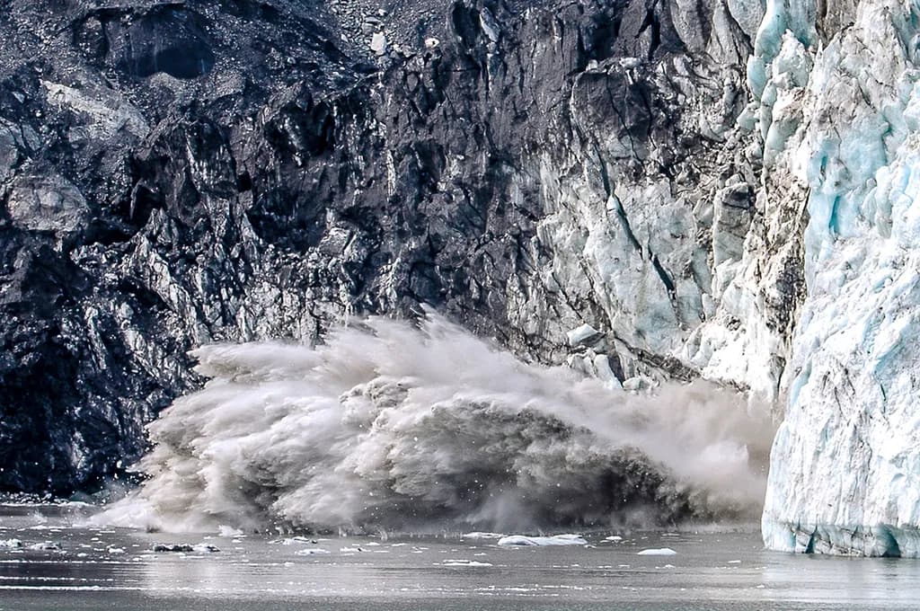 Glacial Symphony: The Majestic Collapse of Ice and Earth