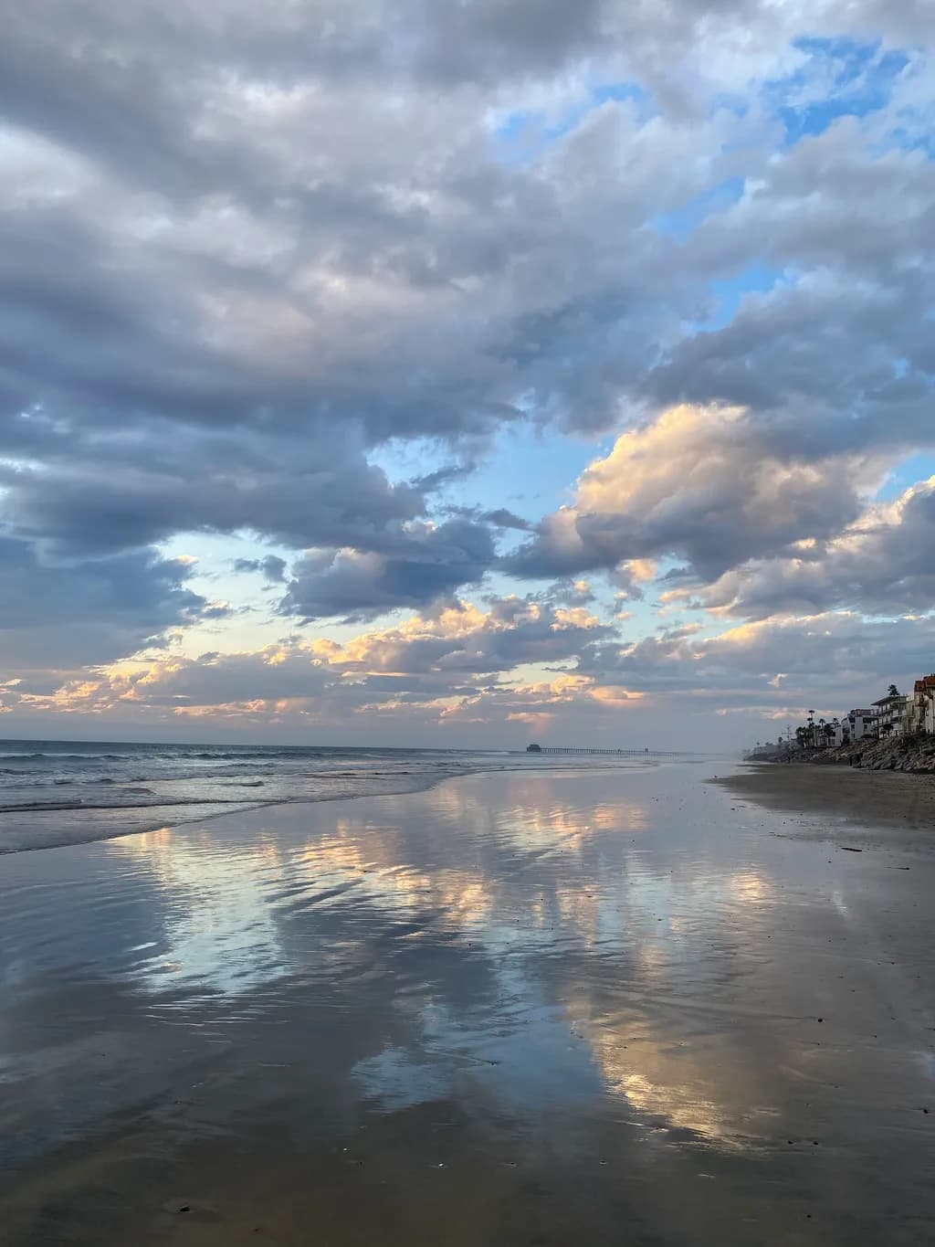 Serenity by the Shore: A Tranquil Reflection of Sky and Sea at Dusk