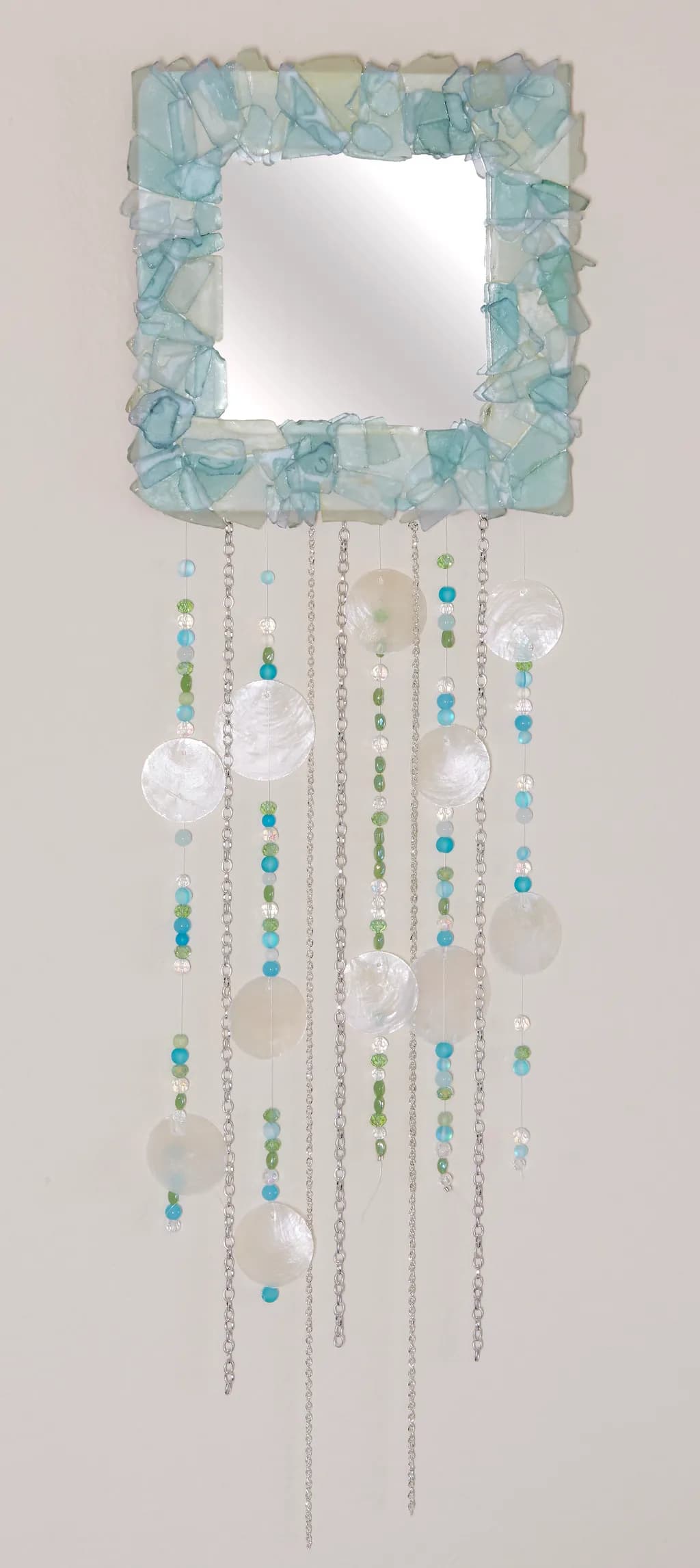 Whimsical Blue Beaded Mirror with Cascading Shells and Decorative Charm