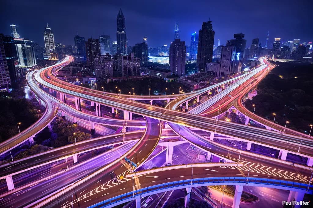 Urban Symphony: A Nighttime Journey Through the Cityscape's Vibrant Highways