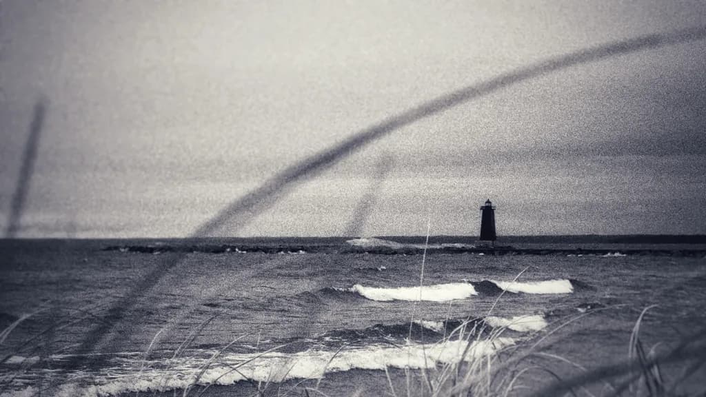Whispers of the Sea: A Lighthouse in the Misty Horizon