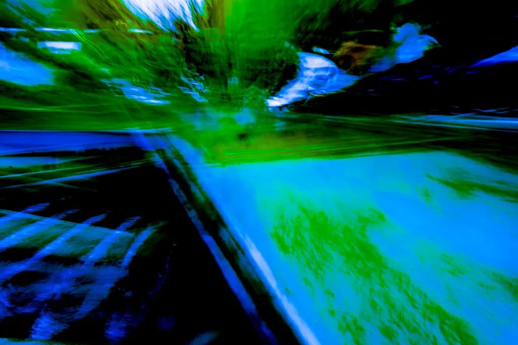 Vibrant Motion: A Dance of Blue and Green in Abstract Landscapes