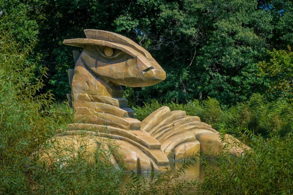 Whispers of the Dragon: A Serene Sculpture Amidst Nature's Embrace