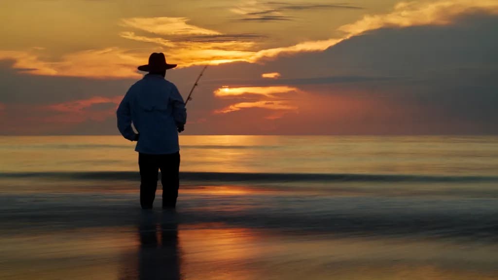 Serenity at Sunset: A Fisherman’s Reflection on Tranquil Waters