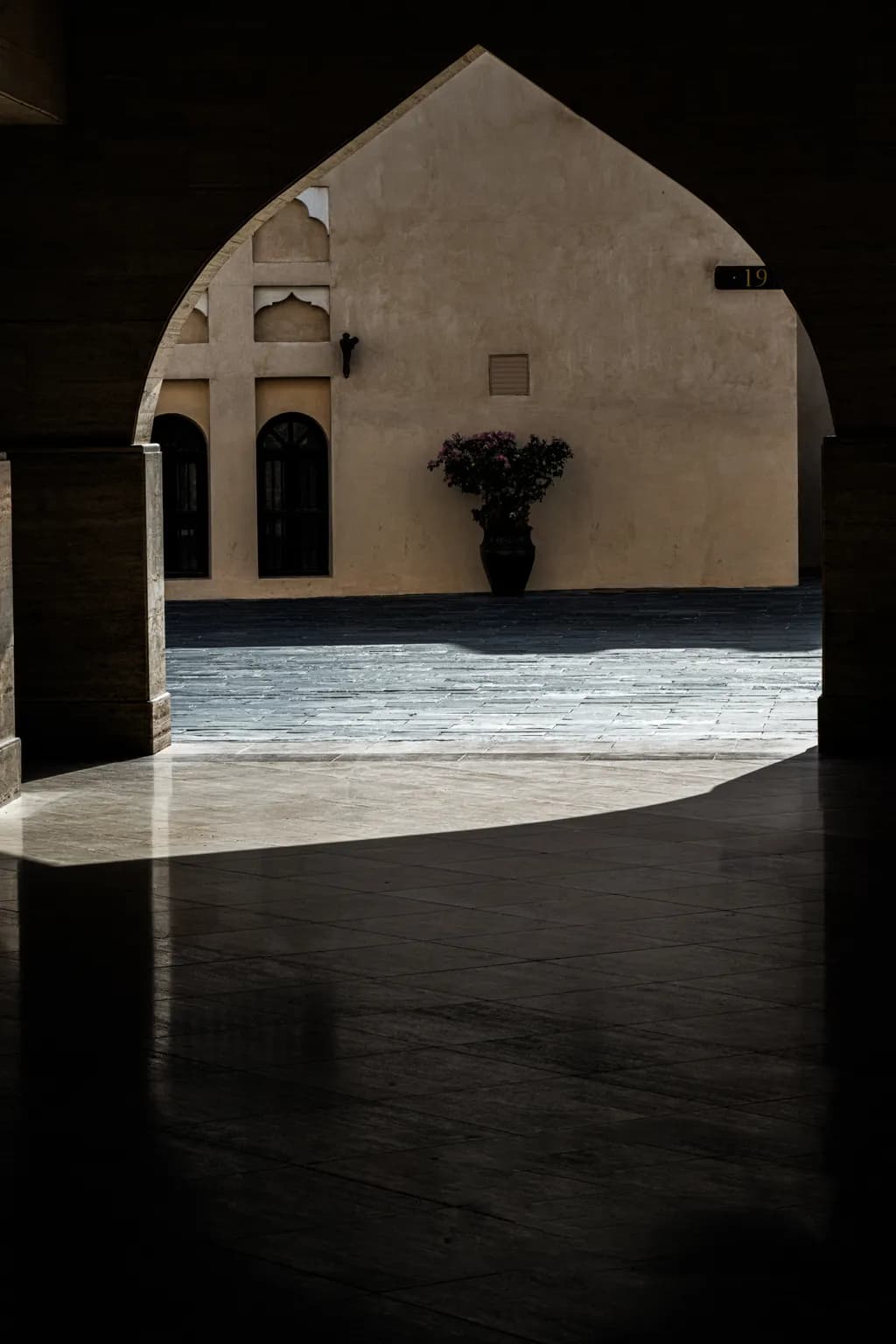 Whispers of Light: A Playful Dance of Shadows and Serenity in Architectural Elegance
