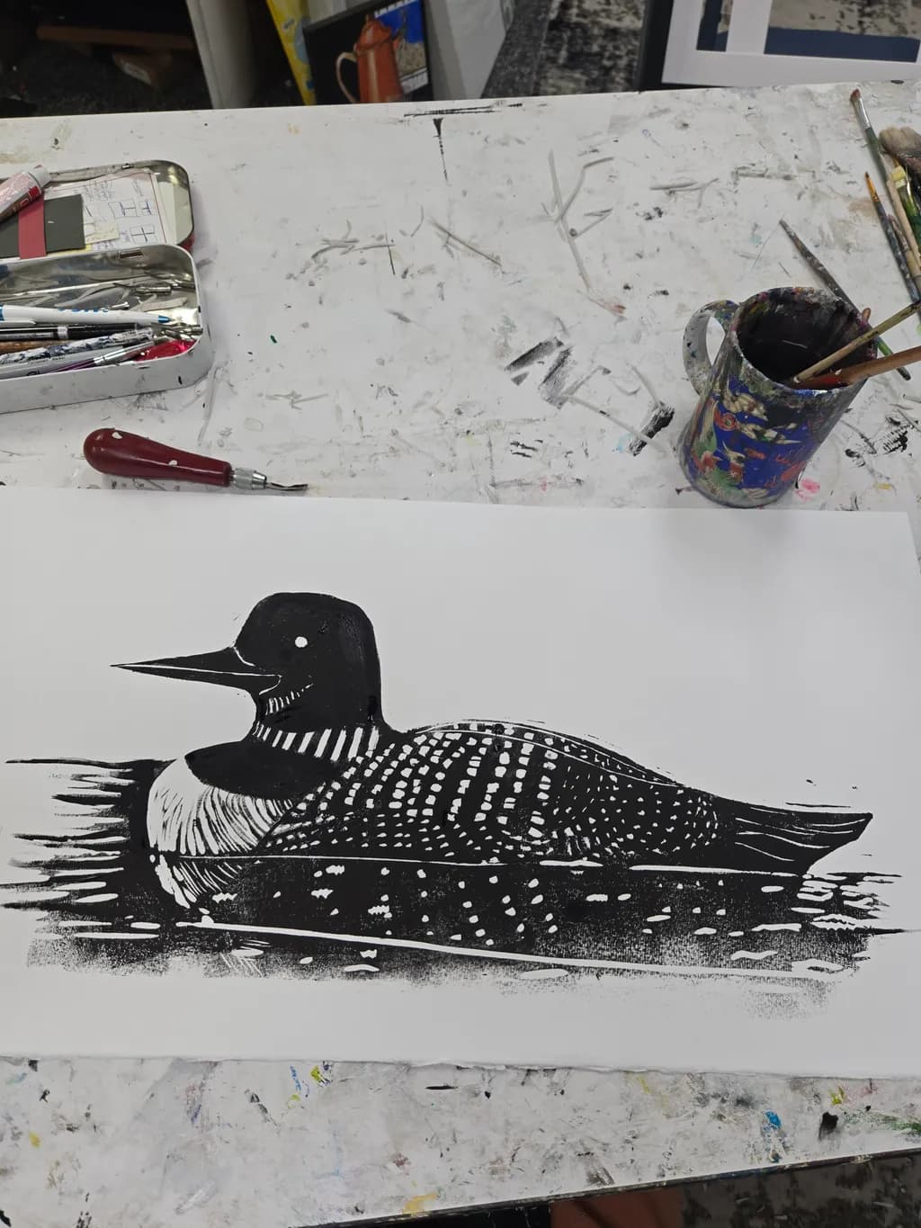 Loon Reflections: A Monochrome Study of Nature's Elegance