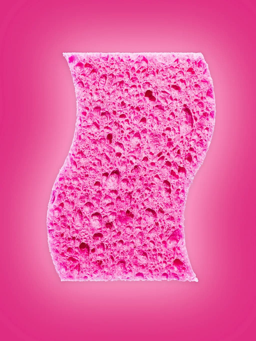 Vibrant Pink Sponge: A Textured Exploration of Cleanliness and Softness