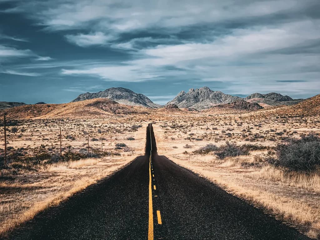 Endless Horizons: A Journey Through Desert Roads and Mountain Dreams