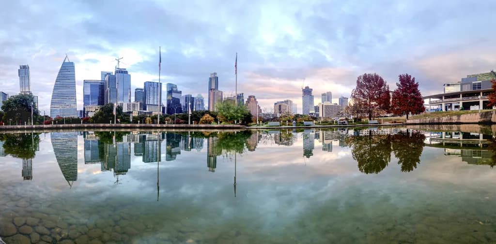 Reflections of Resilience: A City’s Heartbeat in Still Waters