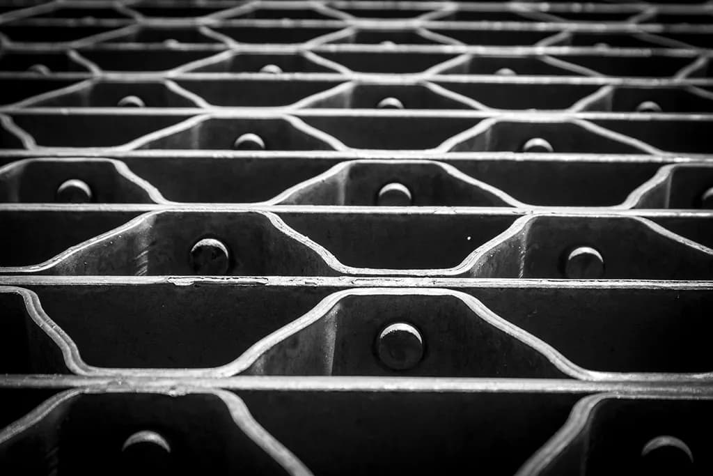 Industrial Harmony: A Black and White Exploration of Geometric Patterns in Metal