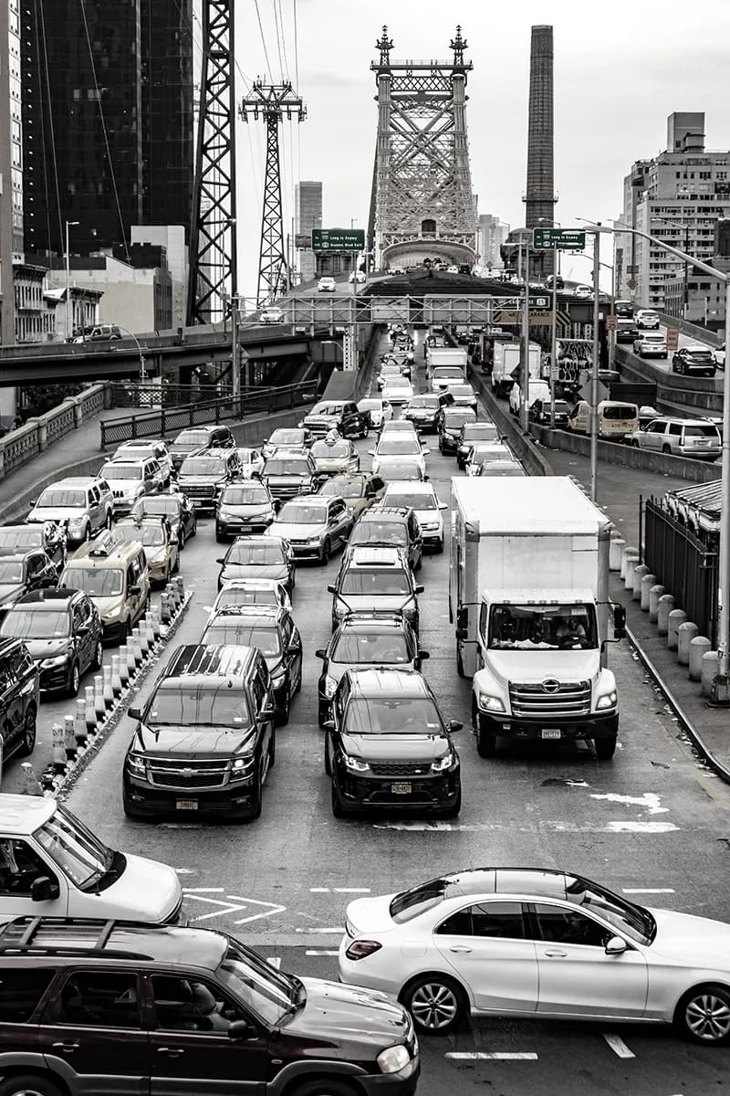Urban Symphony: Monochrome Chaos of the City Traffic Bridge