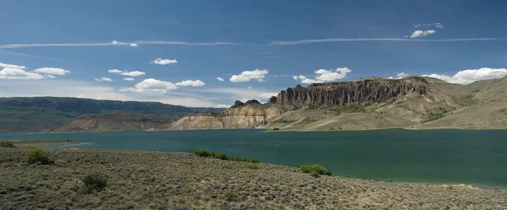 Serenity by the Cliffs: A Tranquil Landscape of Water and Sky