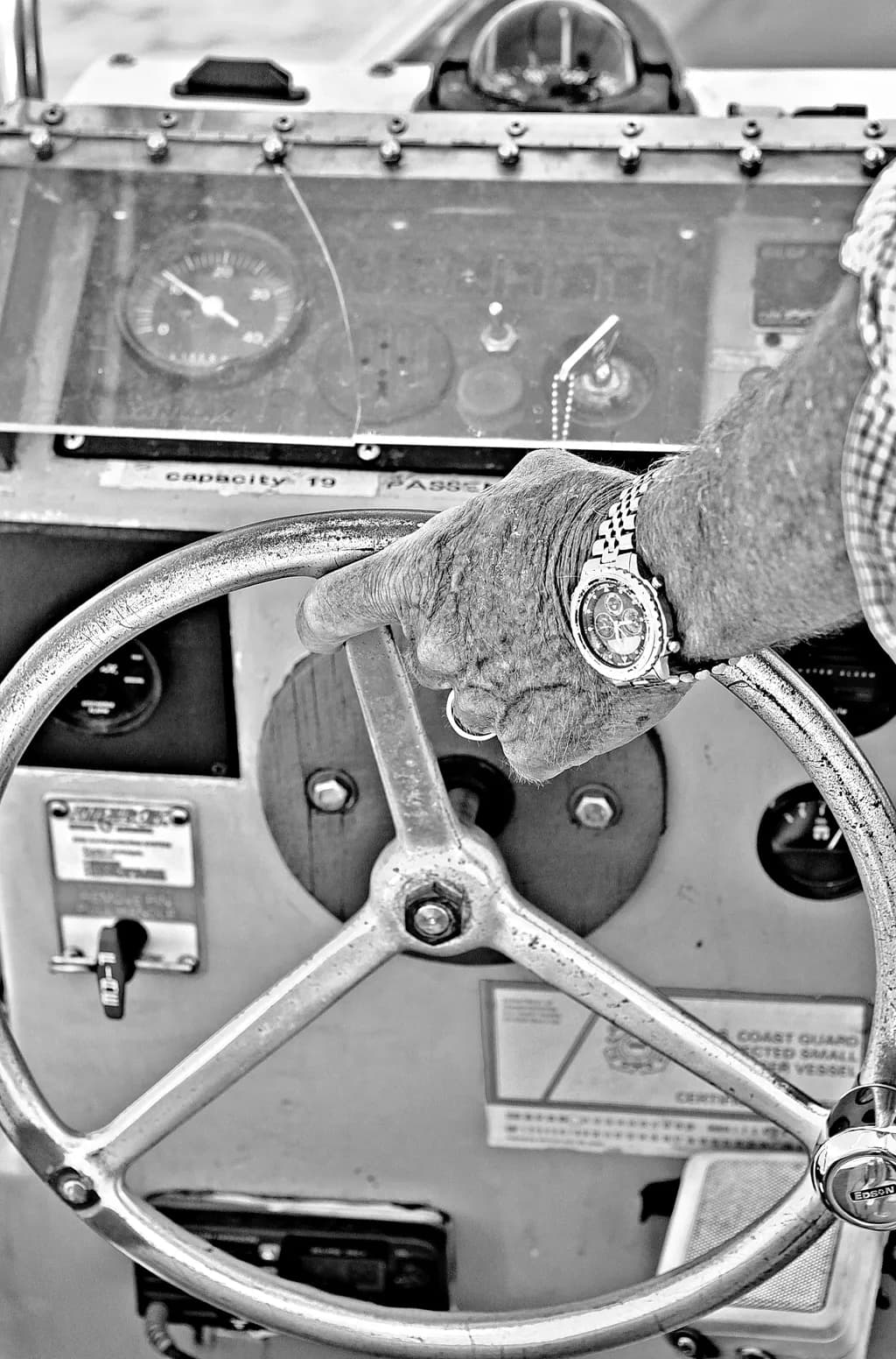 Navigating Time: A Vintage Hand on the Wheel of Control