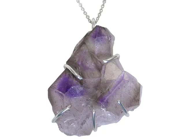 Amethyst Dream: Raw Elegance in Silver Embrace