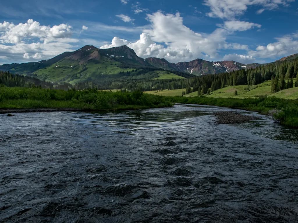 Whispers of the Mountain Stream: A Serene Landscape Journey Through Nature's Embrace