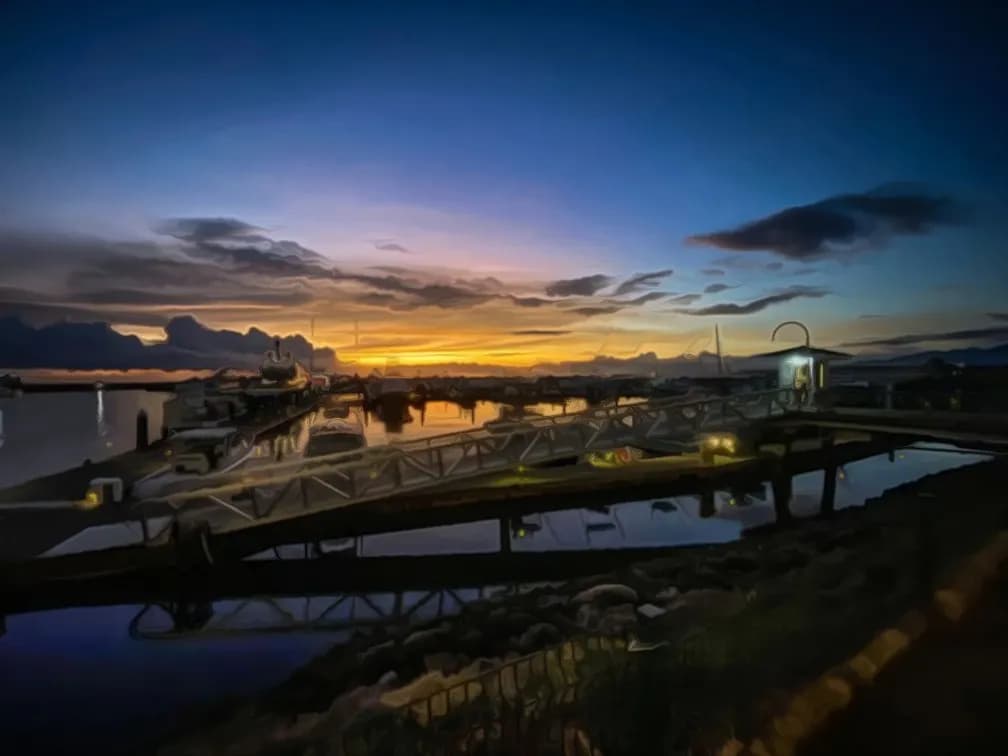 Serenity at Sunset: A Tranquil Reflection Over the Harbor Waters