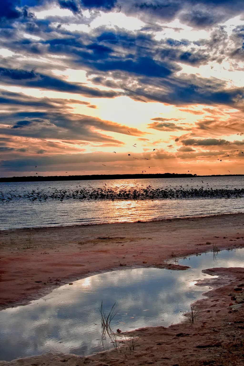 Whispers of the Sky: A Serene Sunset Over Tranquil Waters